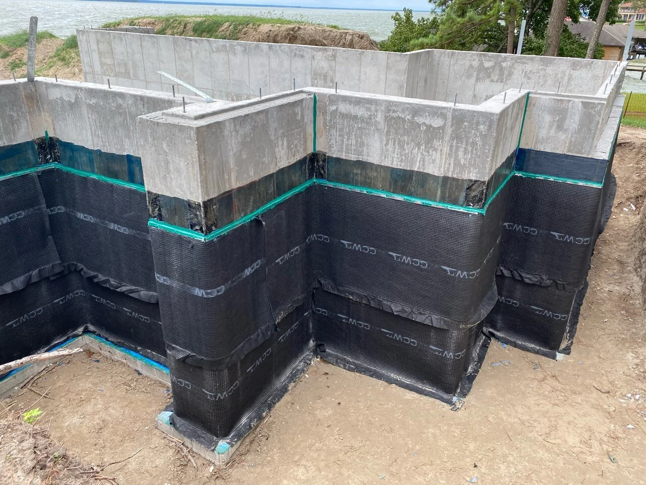Gjervik foundation walls with waterproofing in progress